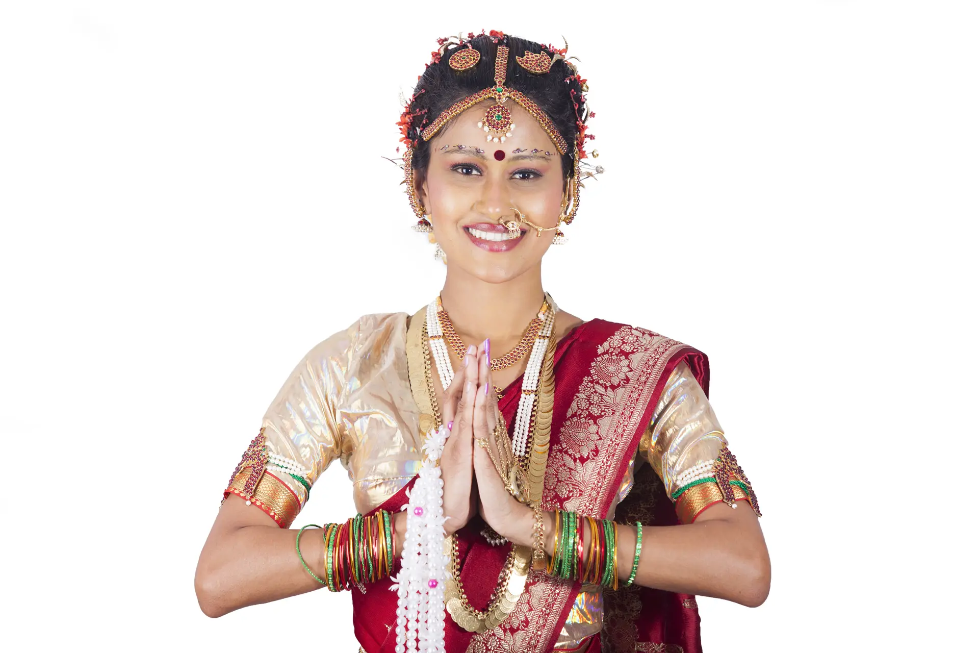 Sri Lankan woman in a saree giving the Ayubowan greeting